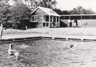 Swimming pool, showing the Refreshment Shed and Changing Sheds c1933 | Hertfordshire Archives and Local Studies
